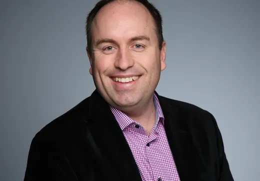 Headshot of Eliseo Jacob.